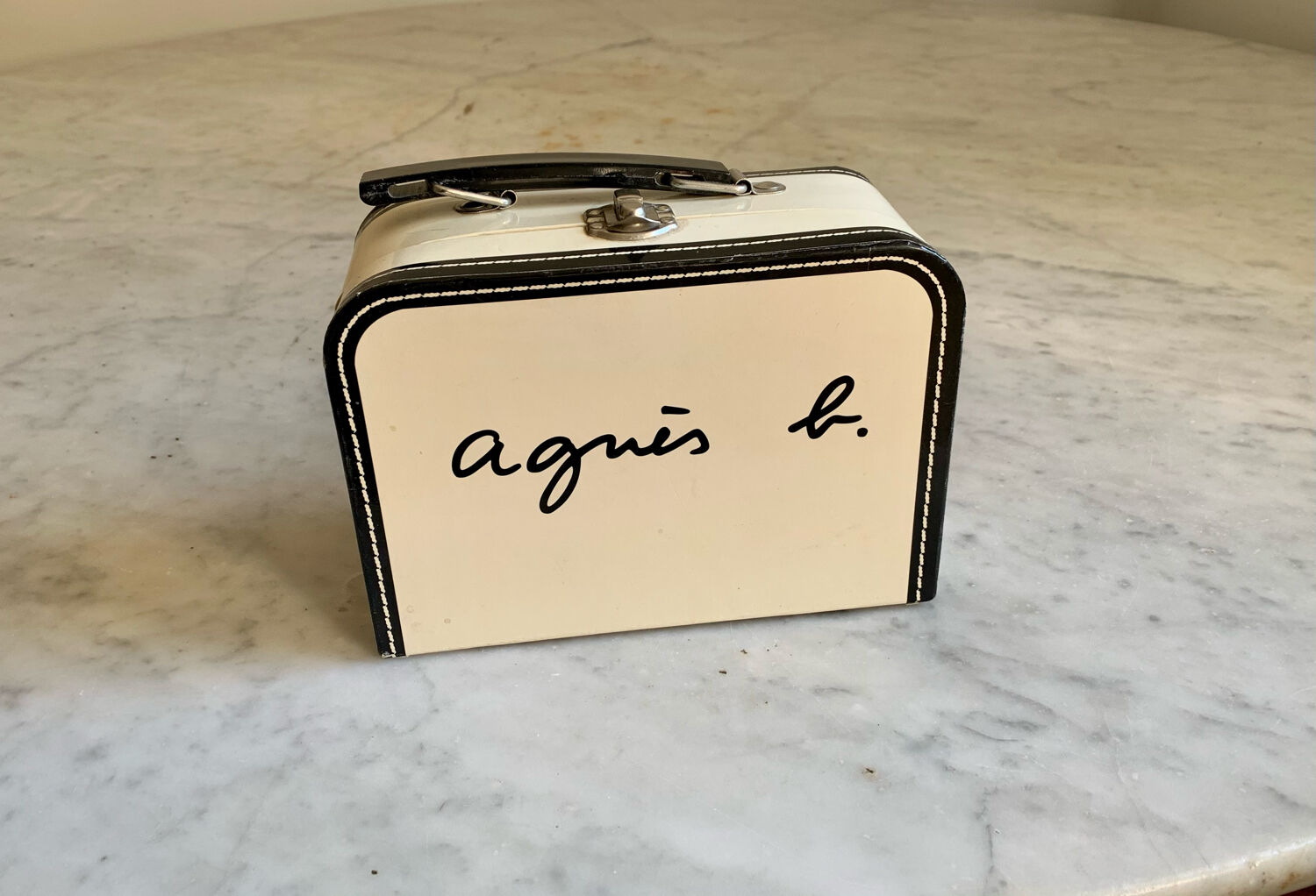 Advertising suitcase Agnès b child