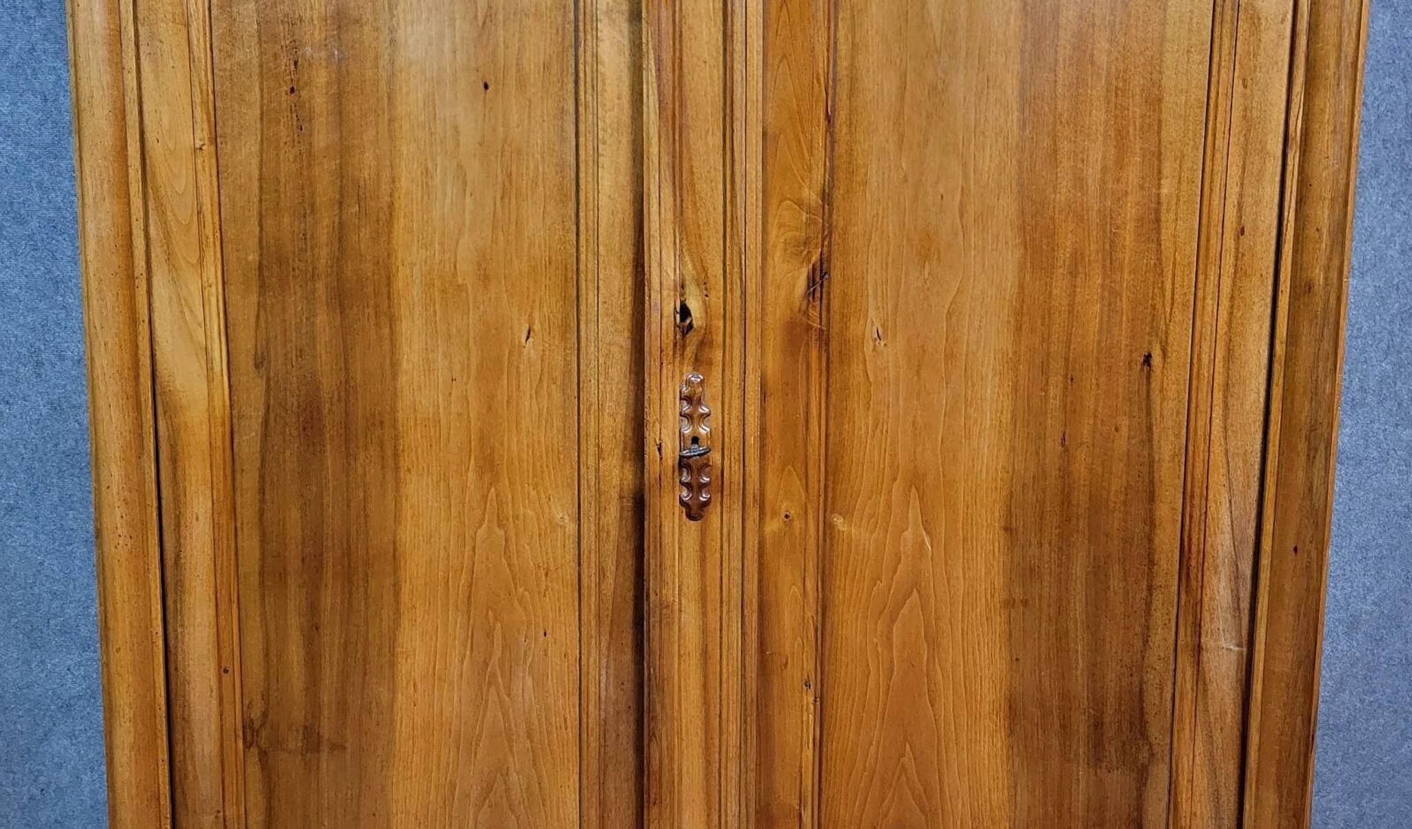 Empire period wardrobe, made of solid walnut, dating from the early 19th century.