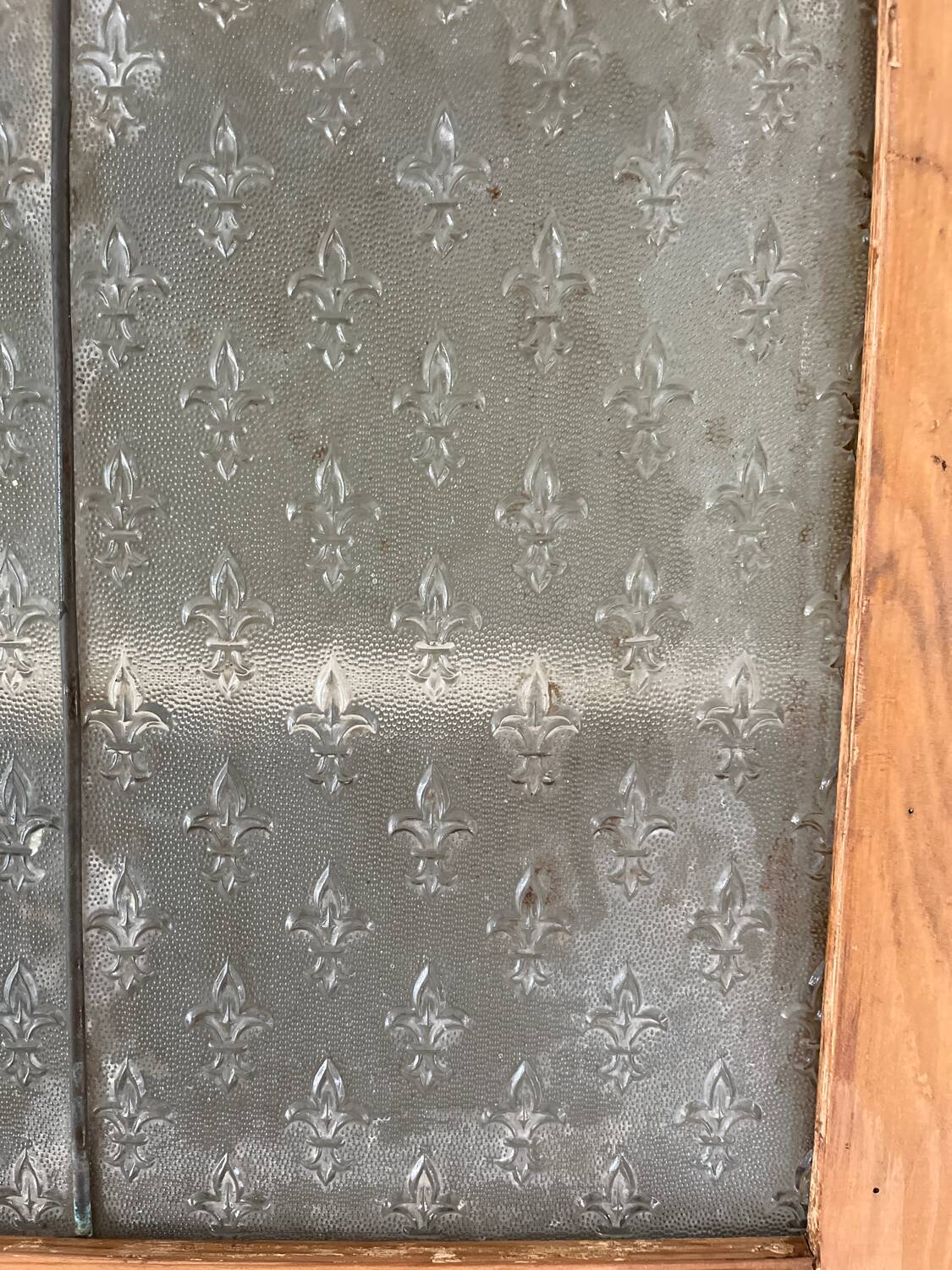 Antique dresser with glass doors and fleur-de-lys from the 50s