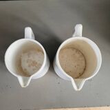 Pair of Digoin porcelain pitchers