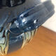 Vase in glazed ceramic decoration drips on blue background