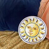 Decorative ceramic plate with sun face