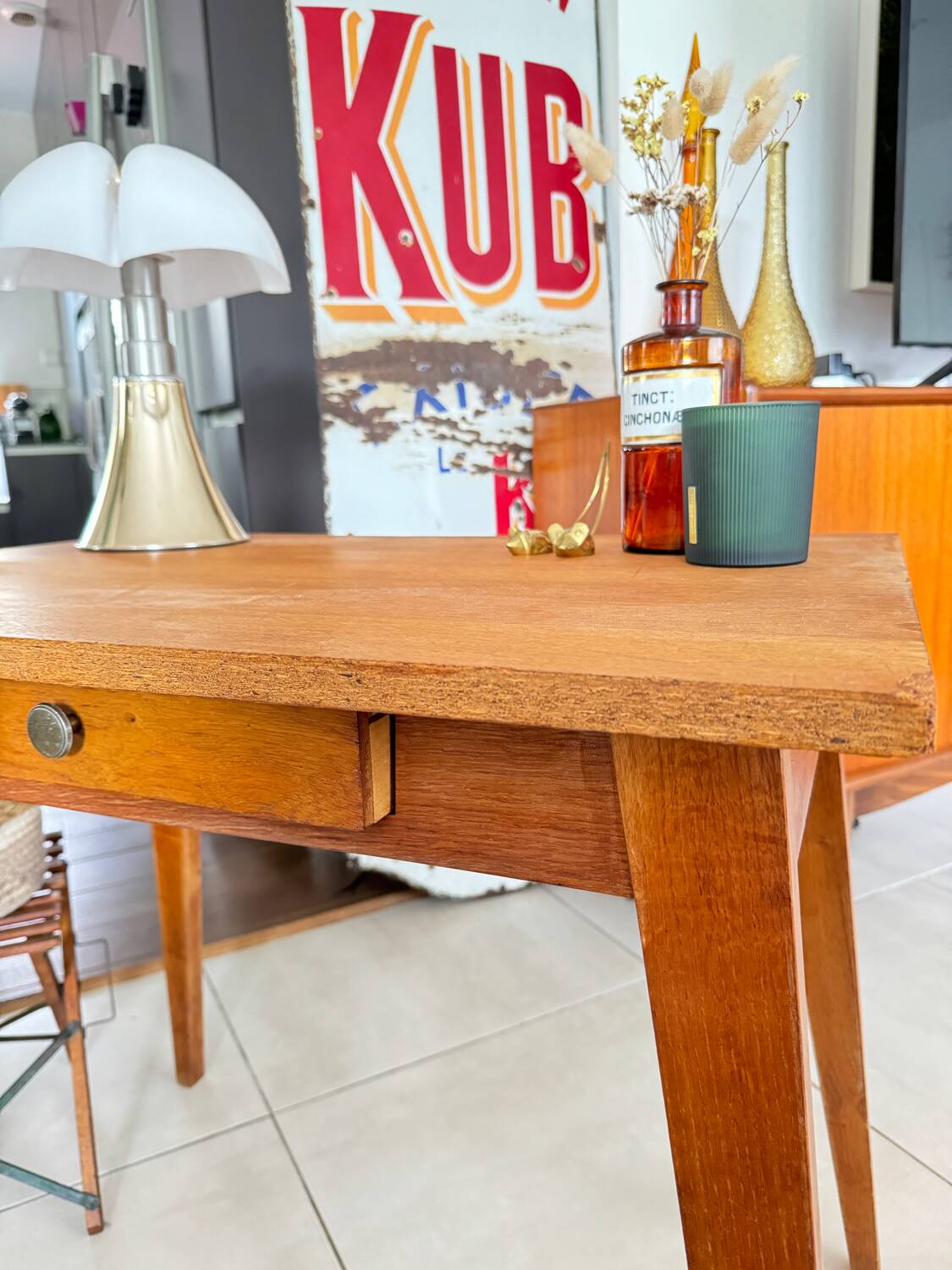 Old wooden desk or side table with compass legs