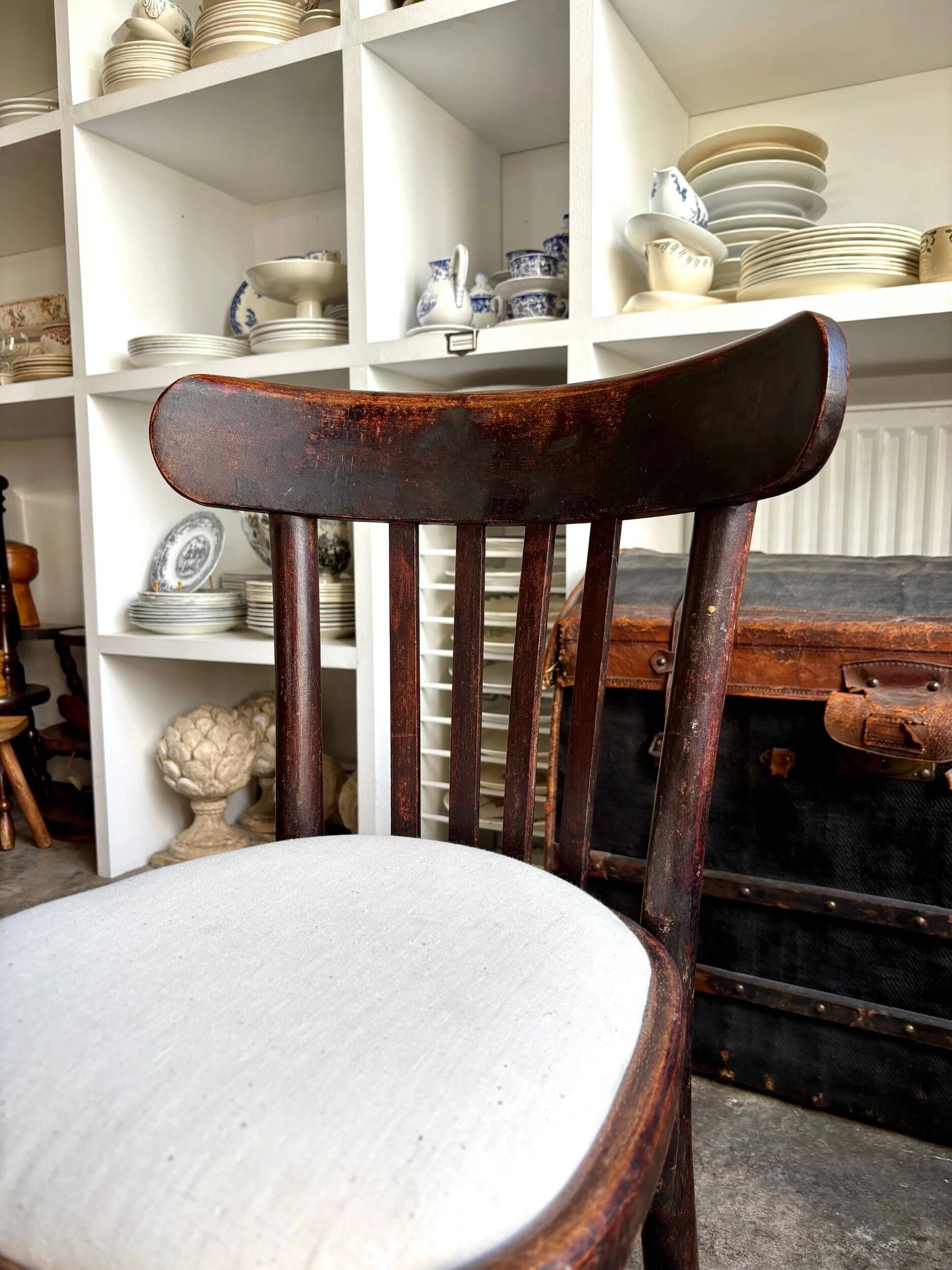 Bistro chair in bent beech and beige mixed fabric.