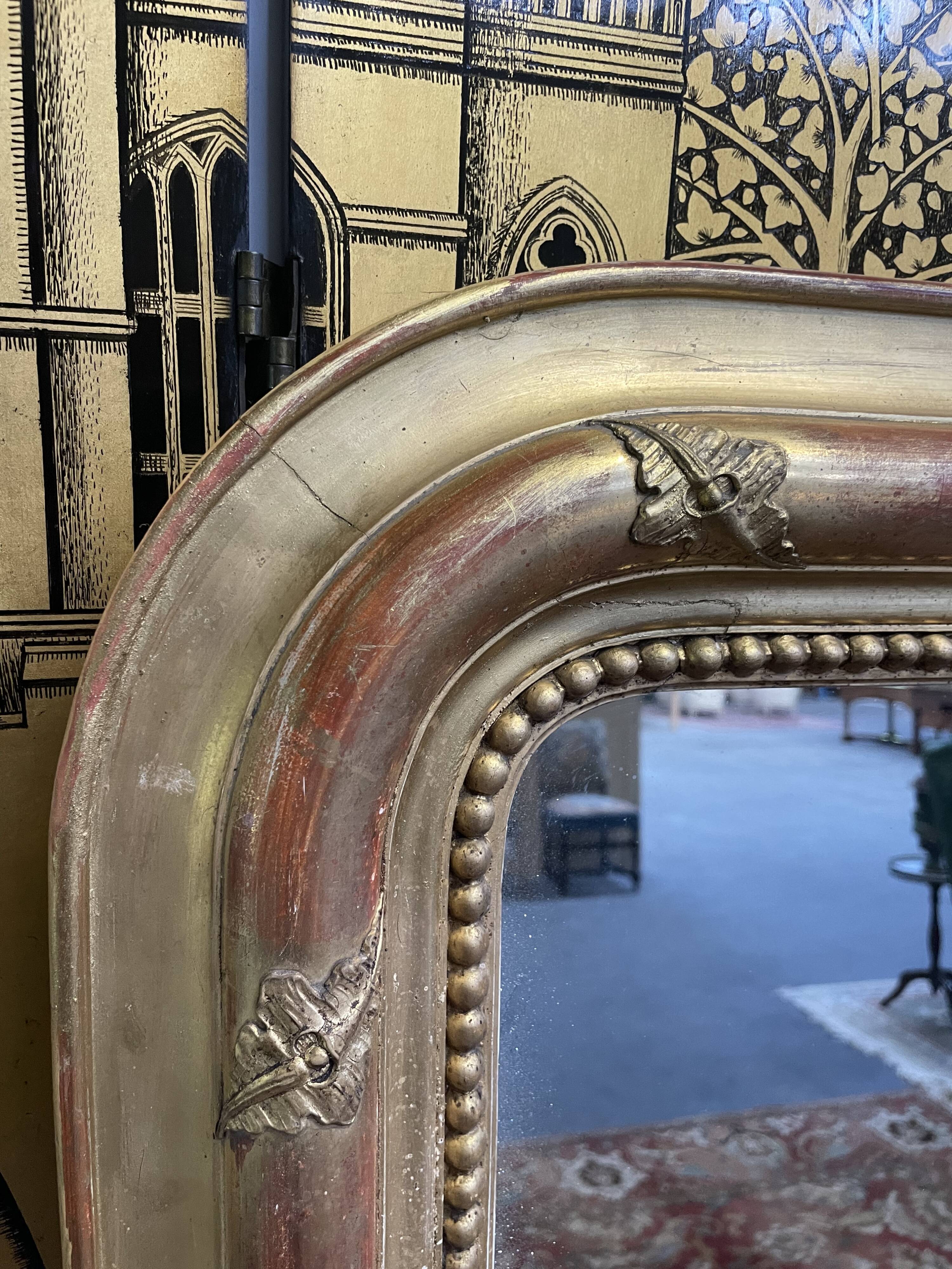 Louis Philippe period mirror in gilded stucco 100x147cm