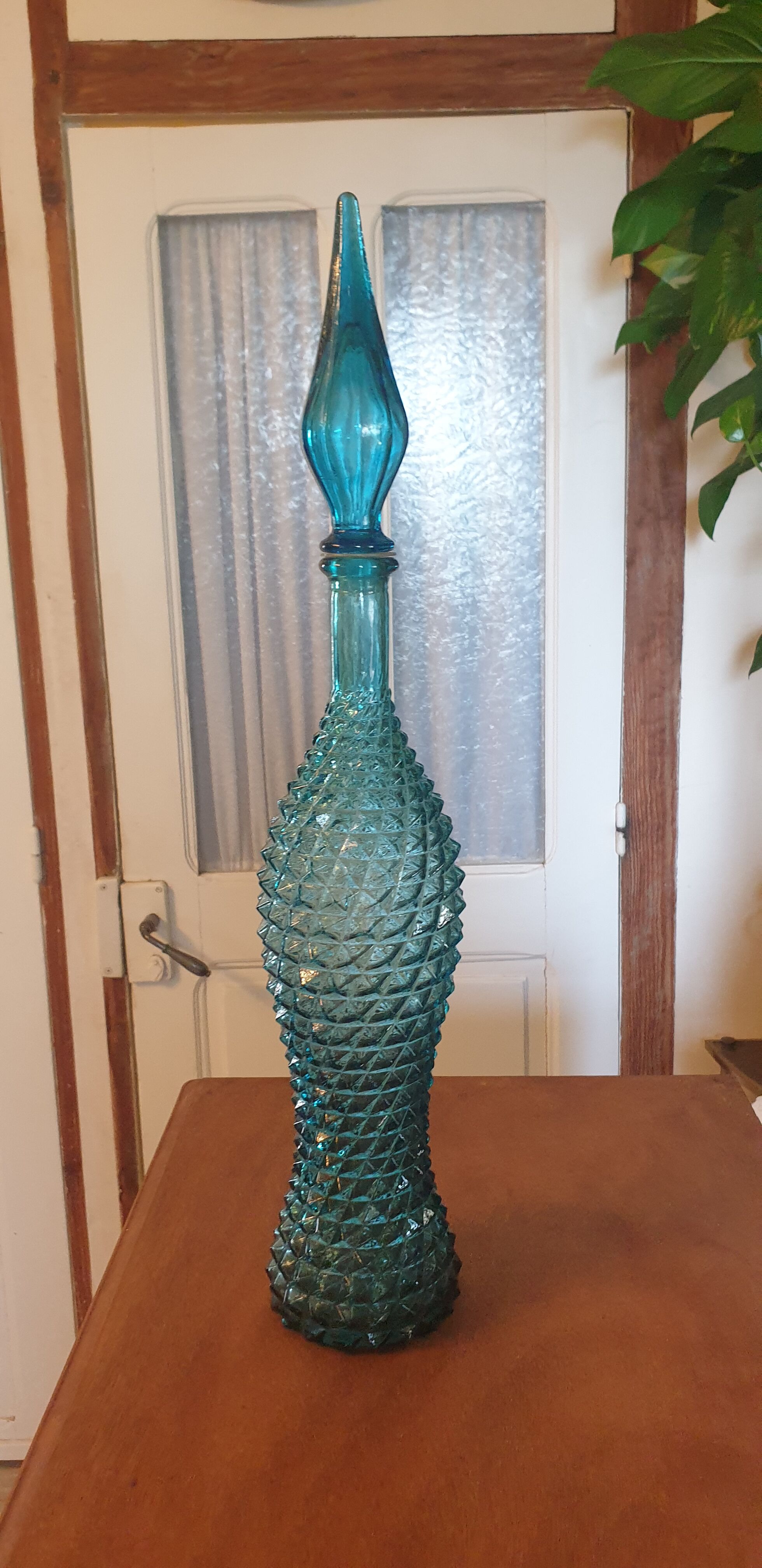 Polished glass bottle