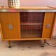 Vintage 1960s bar cabinet, Scandinavian style, on wheels.