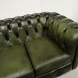Three-seater green leather Chesterfield sofa