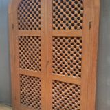 Double oriental door and its frame