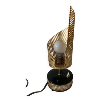 Perforated metal night light.