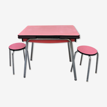 Table with two stools in red formica