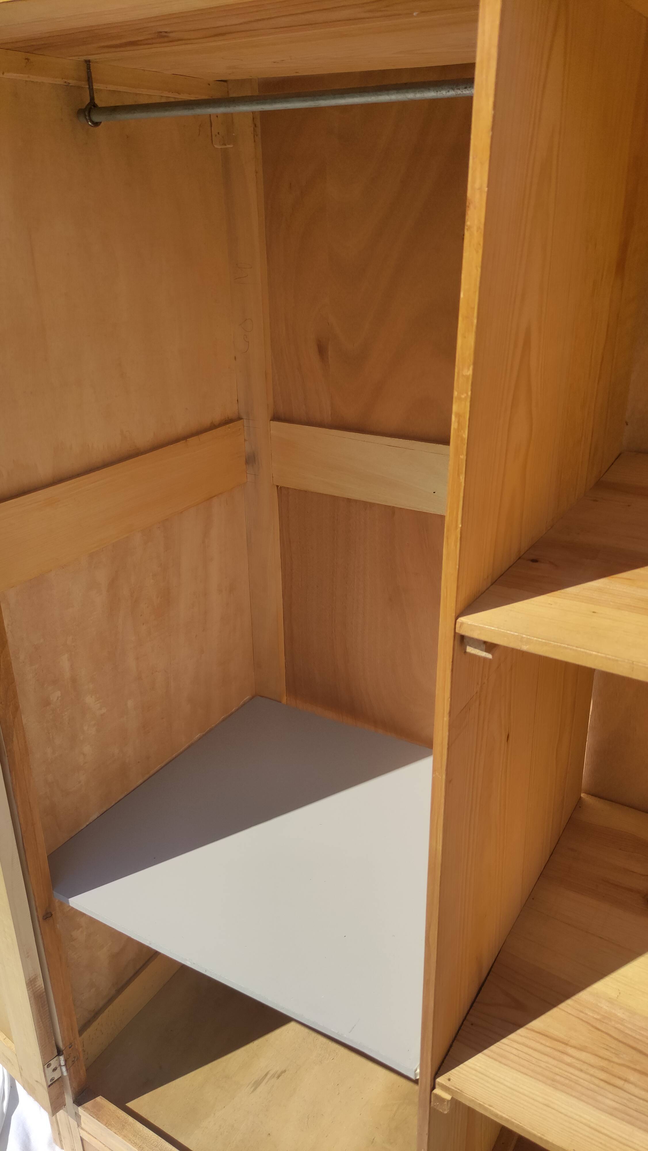 Parisian wardrobe in raw wood