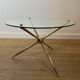 Round tripod designer coffee table in brass