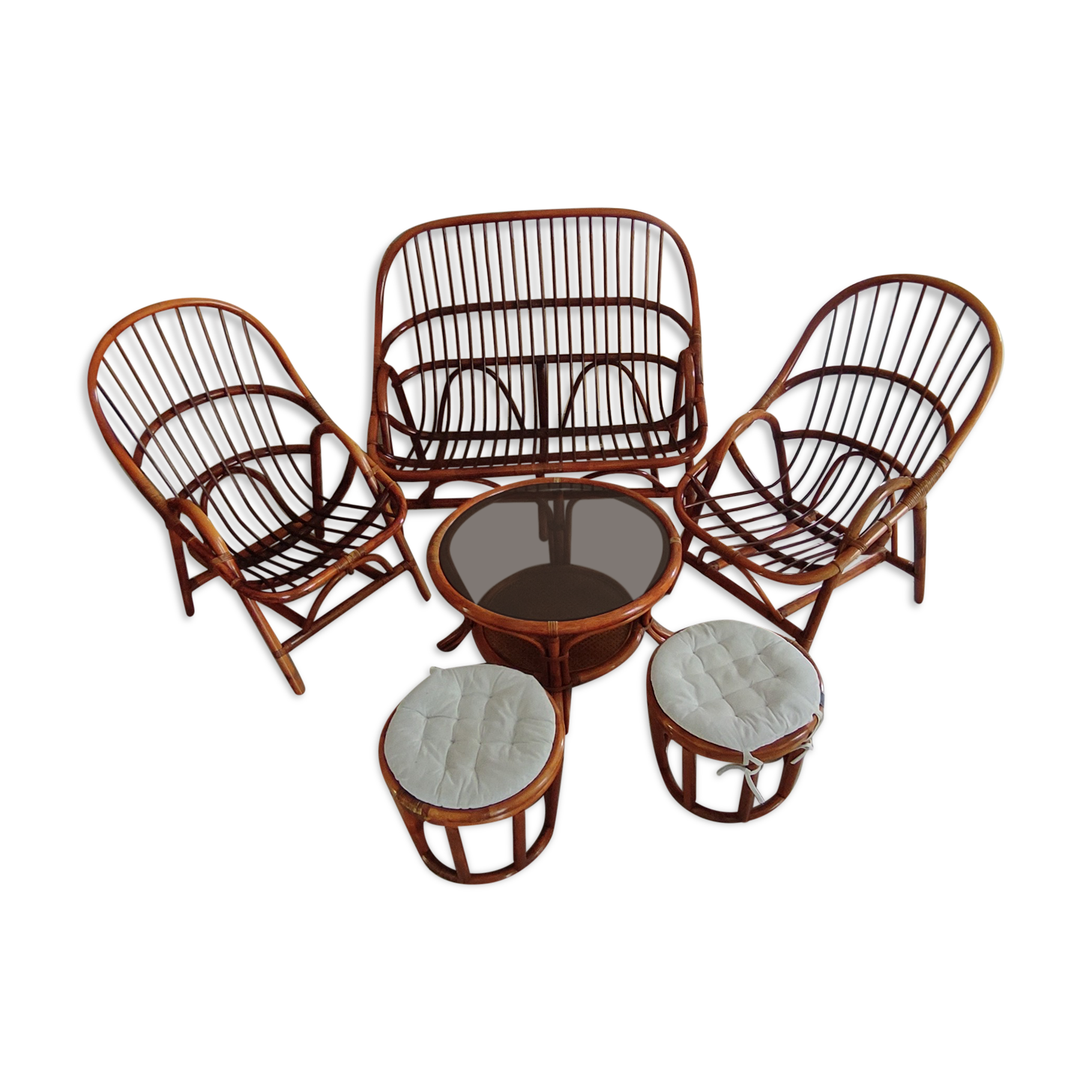 Sofa armchairs and coffee table in vintage rattan of six pieces