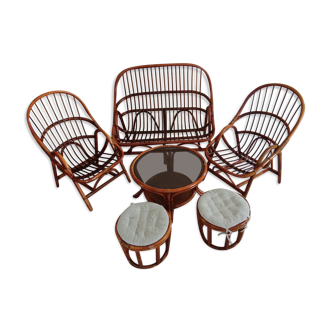 Sofa armchairs and coffee table in vintage rattan of six pieces