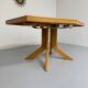 Ancienne table en bois massif octogonal a rallonge design Girsberger