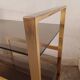 Brass shelf, smoked glass
