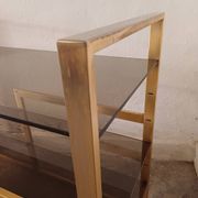 Brass shelf, smoked glass