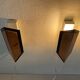 Pair of French wall lights with geometric design in copper, 1960, France.
