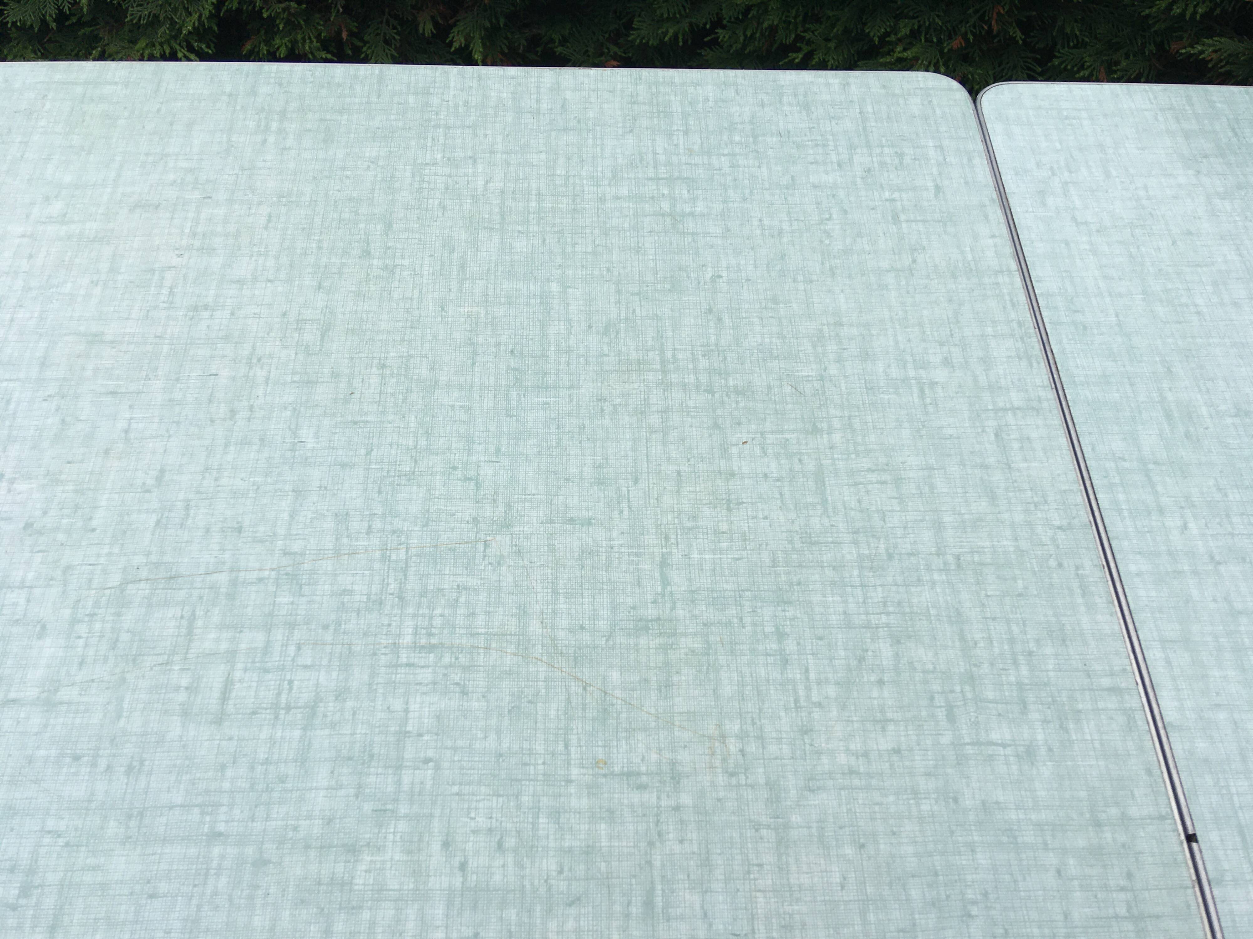 Formica table set with extensions + 4 Plastilux chairs