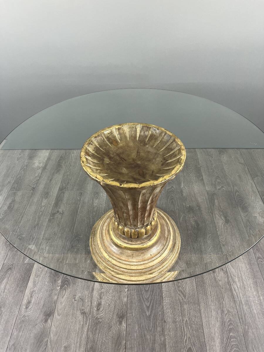 Table with a central carved wooden base, 20th century