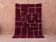 Traditional handmade Moroccan rug from Oued Zam, size 150x250 cm.