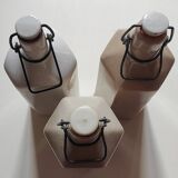 Trio of large hexagonal stoneware hot water bottles