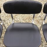 6 vintage chairs in black skaï with chrome metal tubular base.