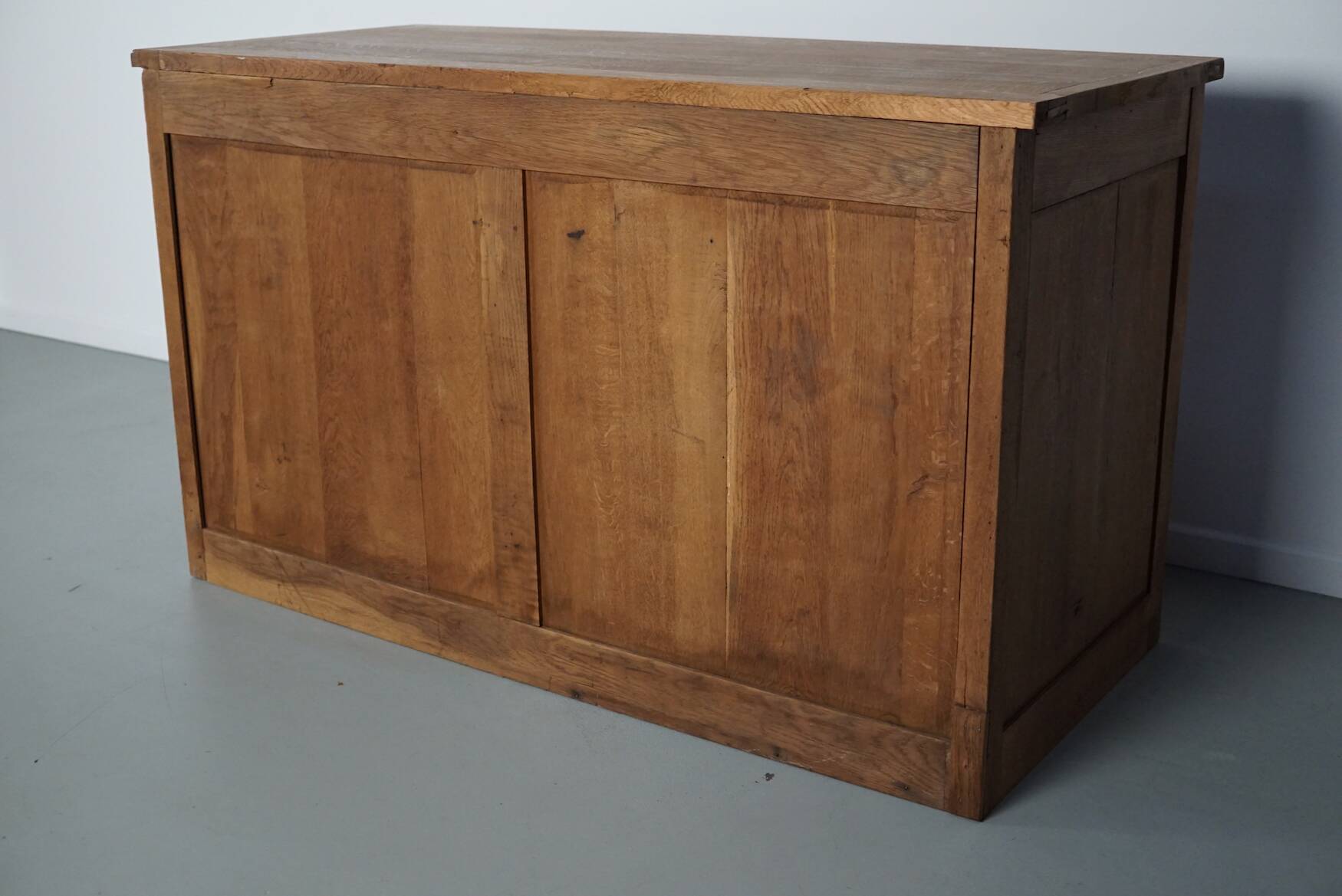 Antique French oak shop cabinet / kitchen island, 1930s