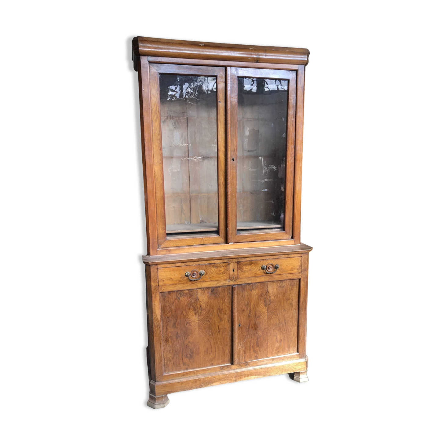 Louis Philippe two-body bookcase in walnut wood.