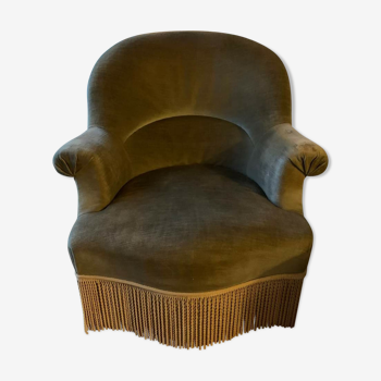 Vintage spitting armchair