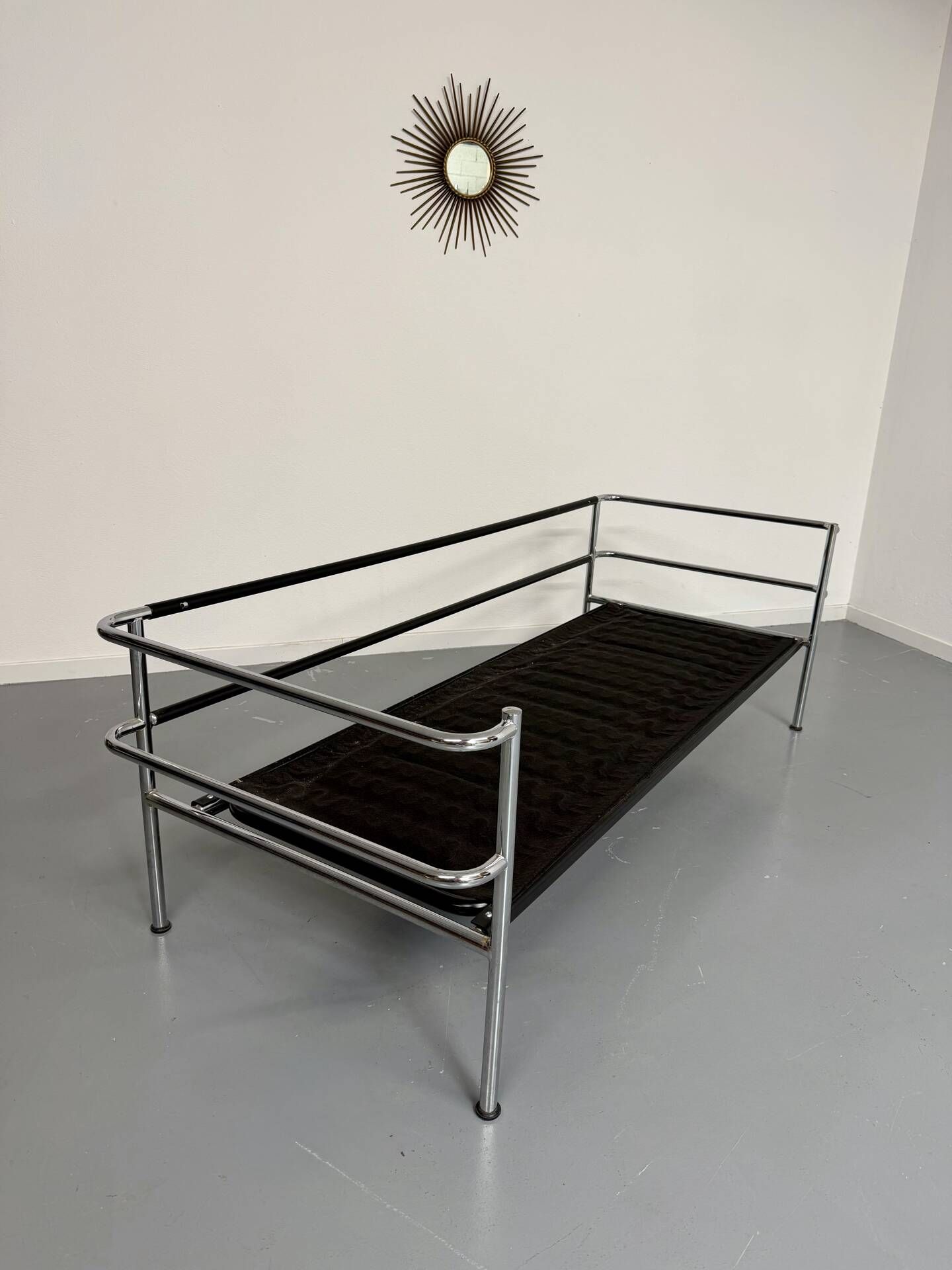 Three-seater tubular chrome and black leather sofa by Kébé, Denmark 80