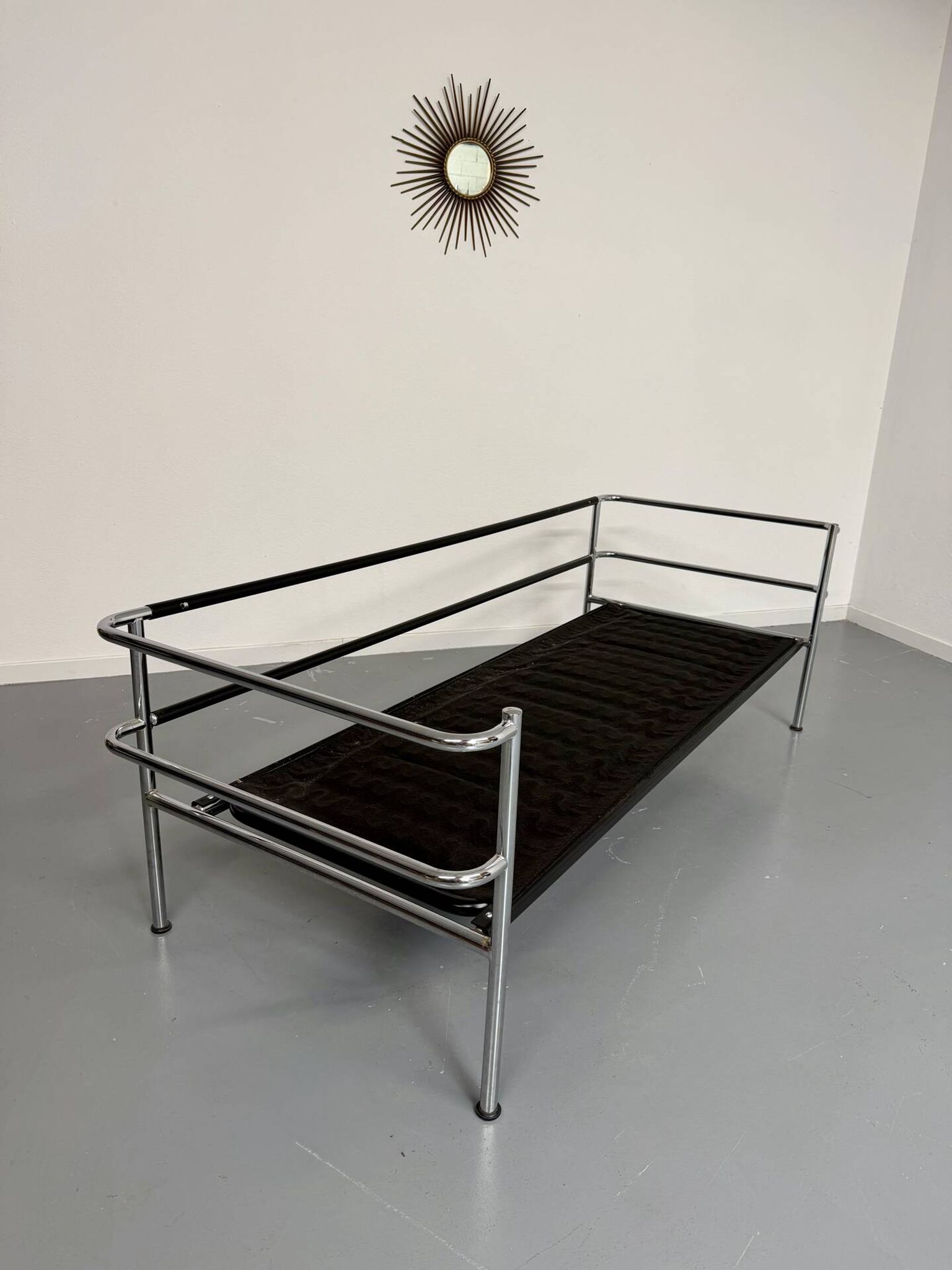 Three-seater tubular chrome and black leather sofa by Kébé, Denmark 80