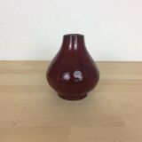 Red ceramic vase with handle
