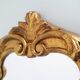 Baroque mirror gilded with gold leaf