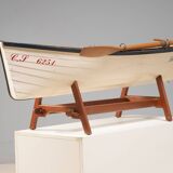 Boat-shaped coffee table reimagined with a glass top, contemporary design (after 2000)