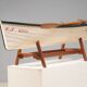 Boat-shaped coffee table reimagined with a glass top, contemporary design (after 2000)