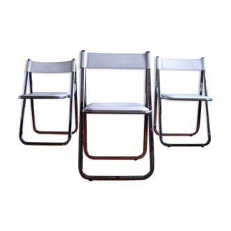 3 chaises pliantes vintage Arrben Tamara en chrome et cuir blanc