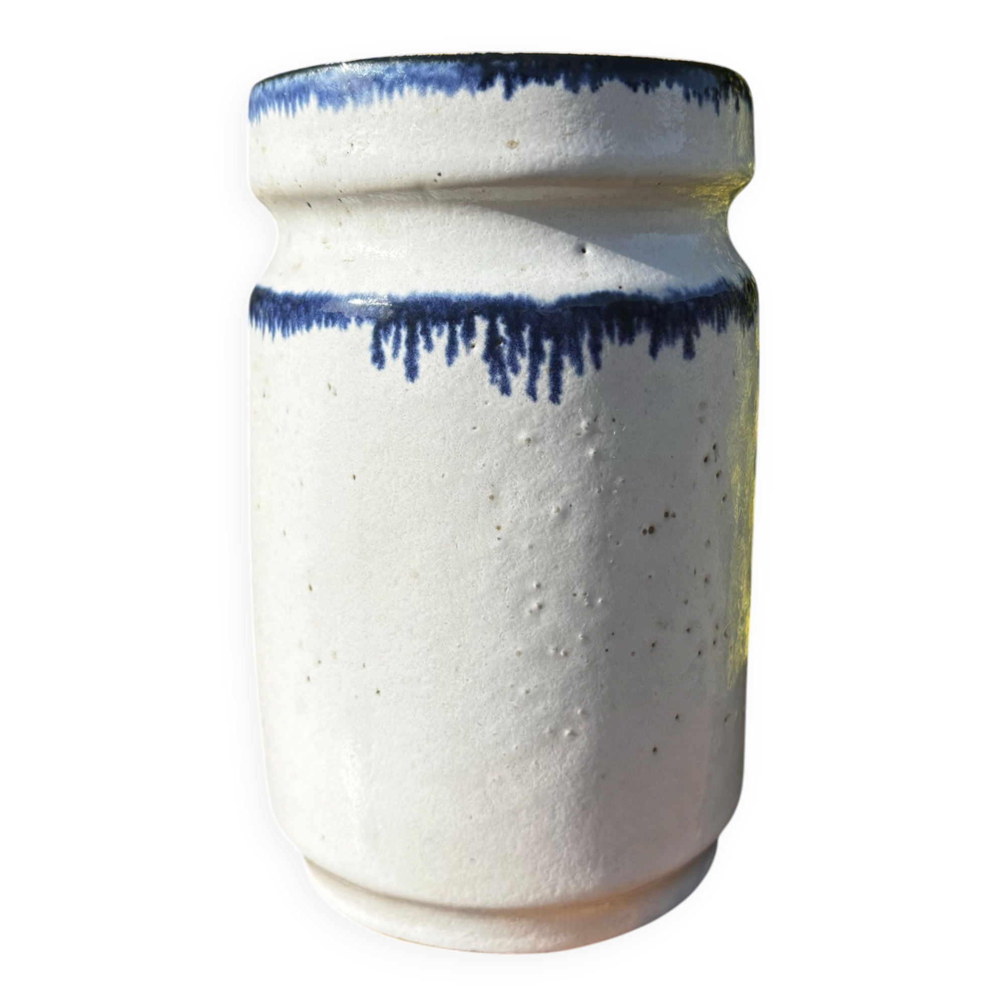Pretty pot or vase in glazed stoneware with blue drip effect.