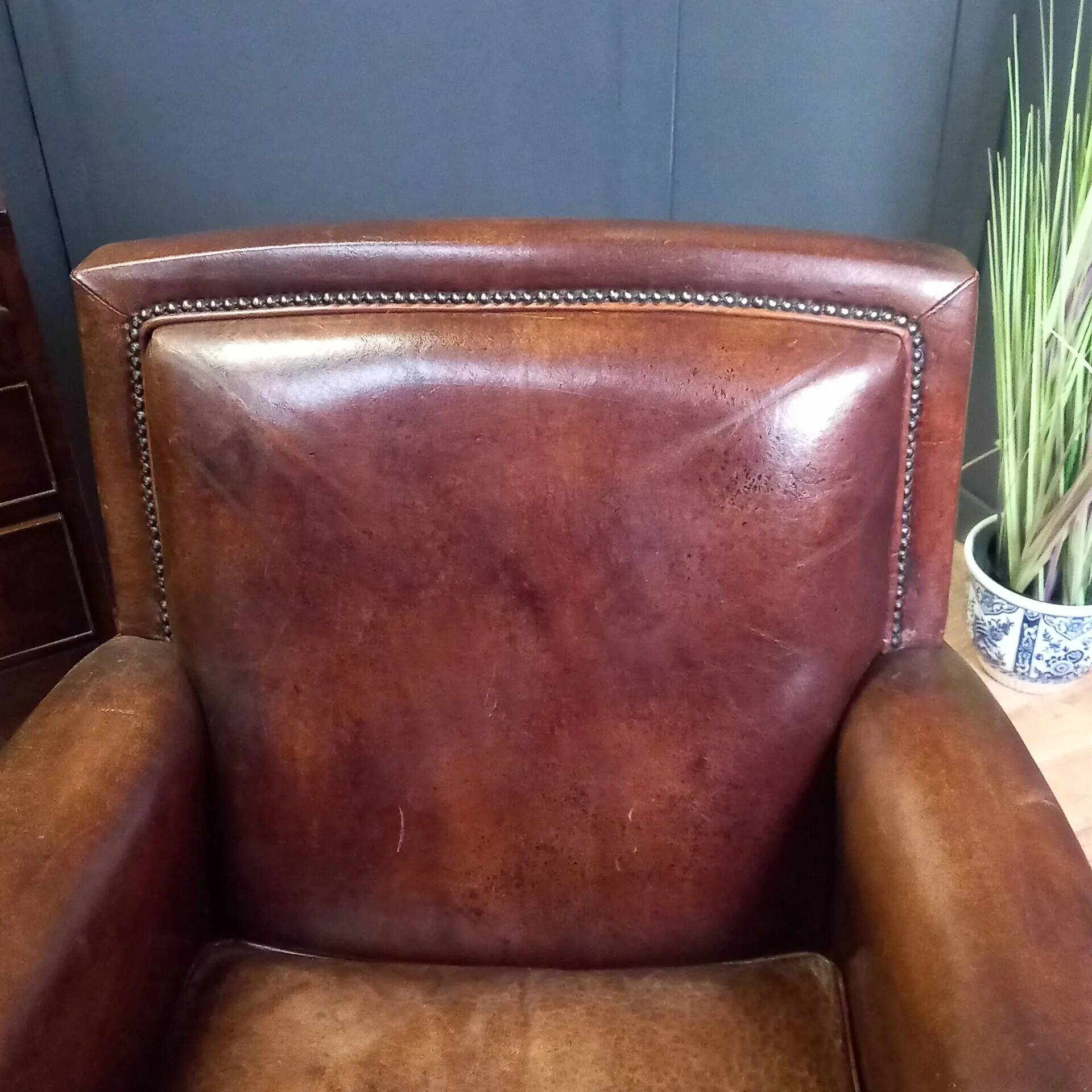 Club armchair in sheepskin in Art Deco style