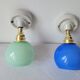 Duo of porcelain and opaline wall lamps