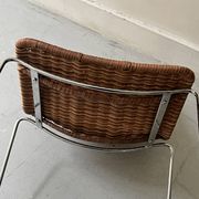 Chair made of rattan, wicker and chrome-plated metal