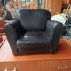 Mini black leather armchair for children
