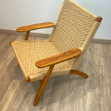 Pair of Scandinavian armchairs in woven solid teak.