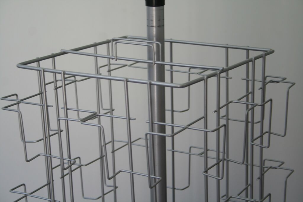 Grey swivel postcard display on wheels