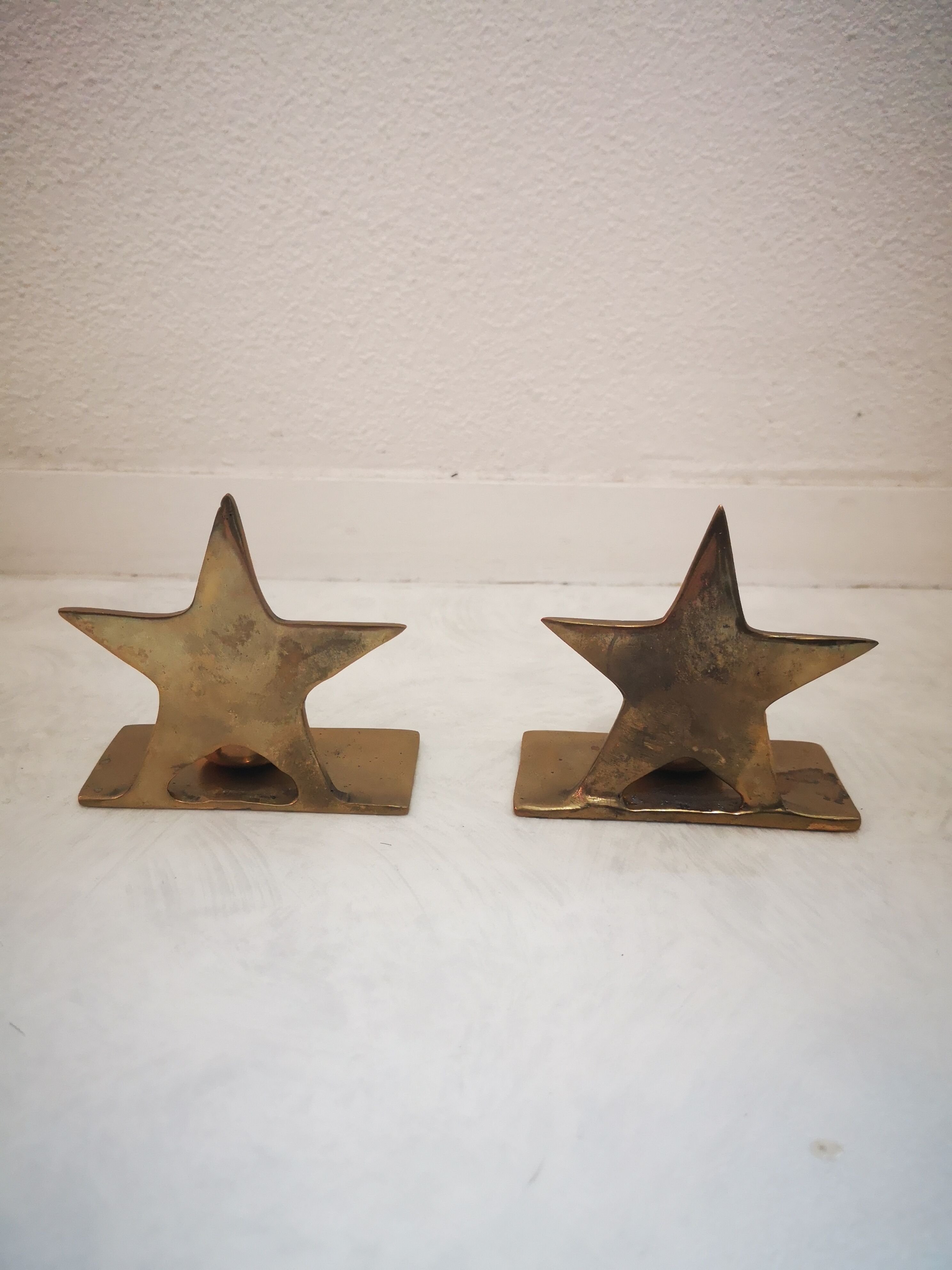 Brass star-shaped candlesticks