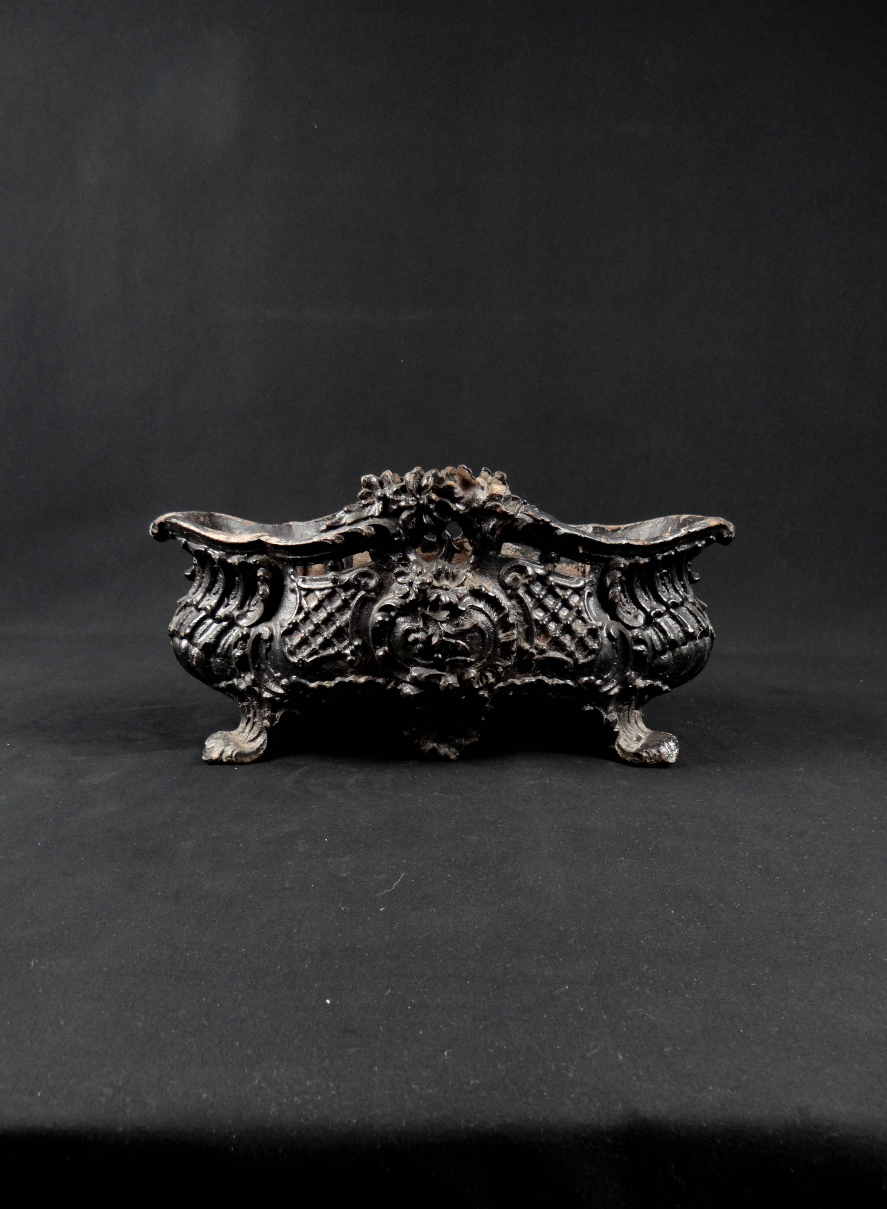Antique black cast iron planter from the late 19th century Rocaille style