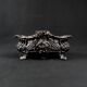 Antique black cast iron planter from the late 19th century Rocaille style