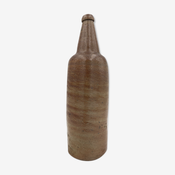 Ancienne bouteille en terre cuite vernissée, début XXème siècle