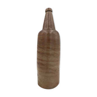 Ancienne bouteille en terre cuite vernissée, début XXème siècle